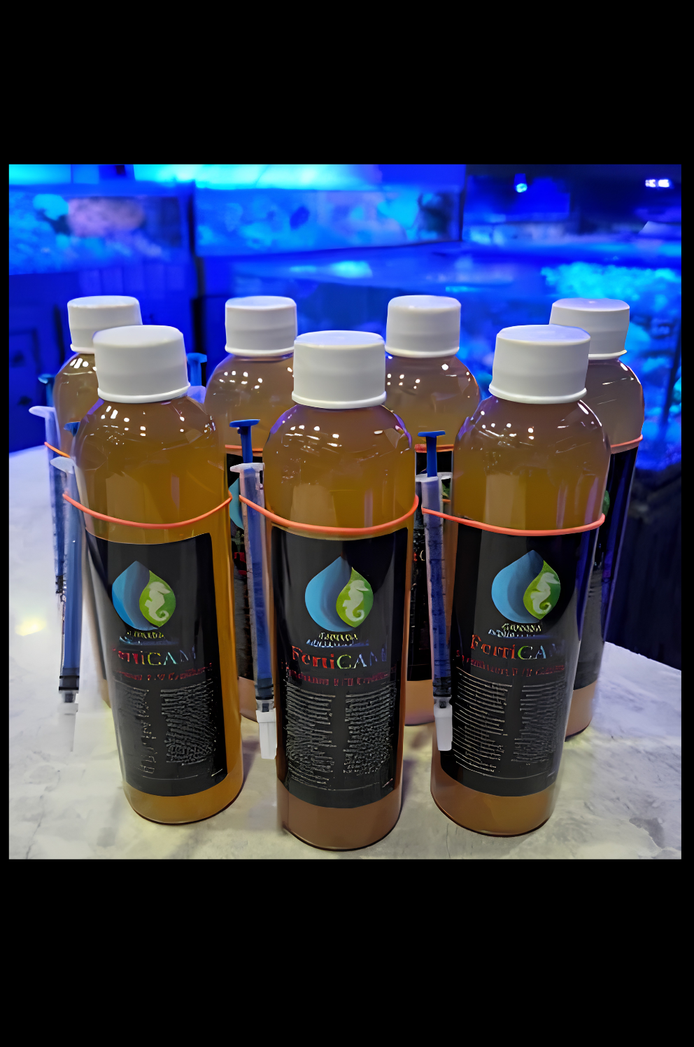 Additif fertilisant pour phytoplancton F/2 Guillard de 250ml, liquide vert avec bouteille de Canada Aquamarine.